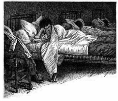 Boy in bed in dormitory