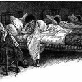 Boy in bed in dormitory