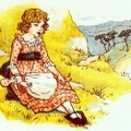 Girl with doll sitting on a hill