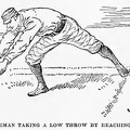 First baseman taking a low throw by reaching forward