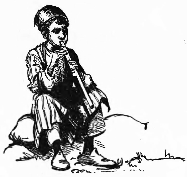 Young boy playing a flute.jpg