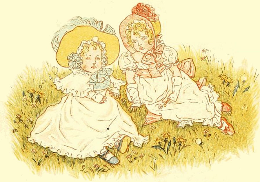 Two little girls sitting on the grass.jpg