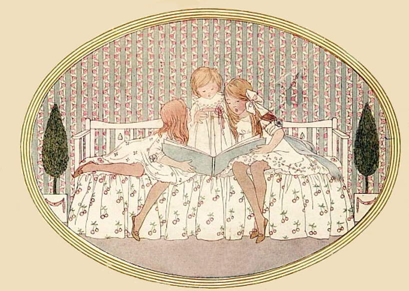 Three Girls reading a book.jpg